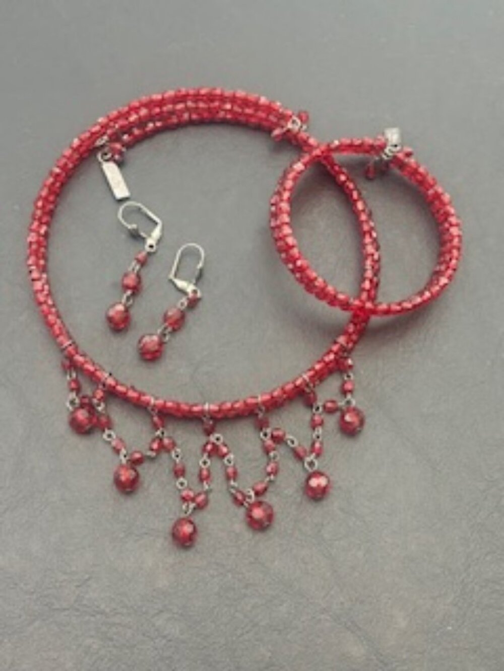 Set of three-Choker necklace, multi row wire bracelet, & dangling drop earrings